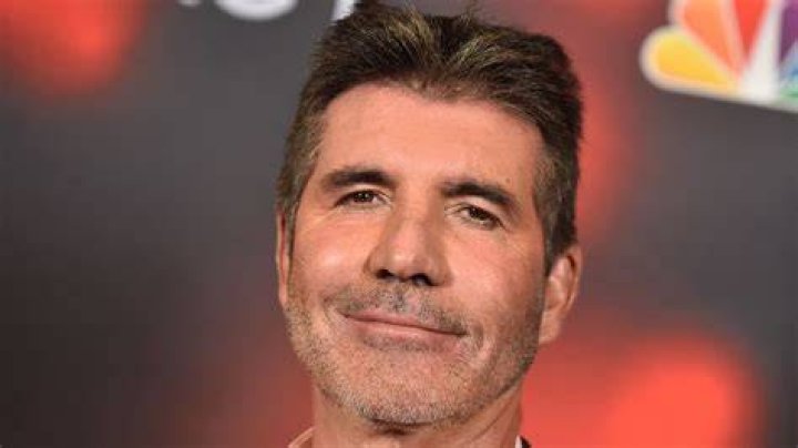 Simon Cowell's son Eric is all grown up in holiday snap!